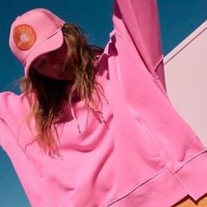 Free People Sprint to The Finish Pink Distressed Sweatshirt Hoodie.